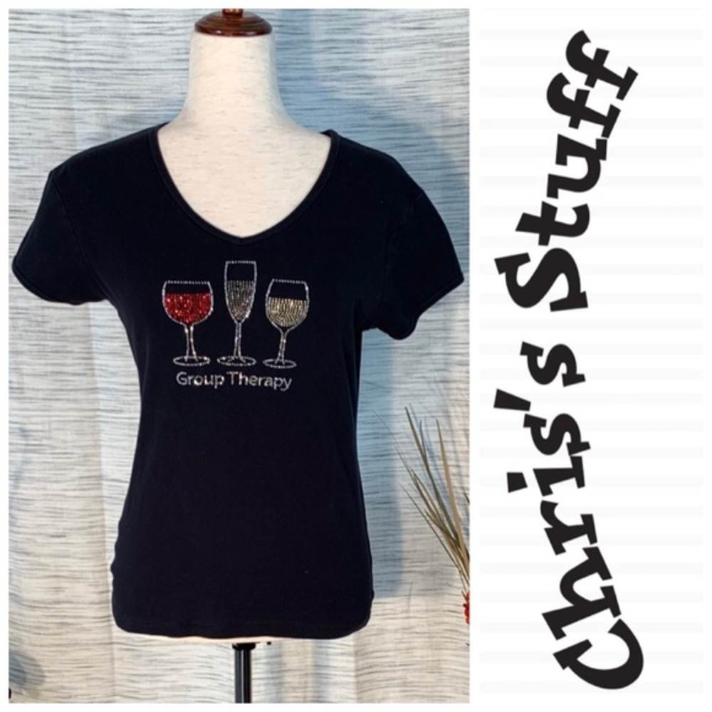 Chris’s Stuff black “Group Therapy” tee shirt.